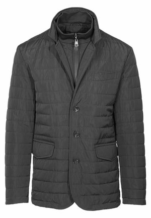 Giacca nera trapuntata con colletto, dotata di chiusura con zip e tre bottoni. Include due tasche frontali e una tasca sul petto.