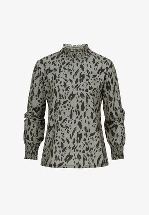 Bluzka z długim rękawem z jasnookiego zielonego materiału z czarnym, abstrakcyjnym wzorem lamparta, z marszczonym kołnierzem i ściągaczami na mankietach.