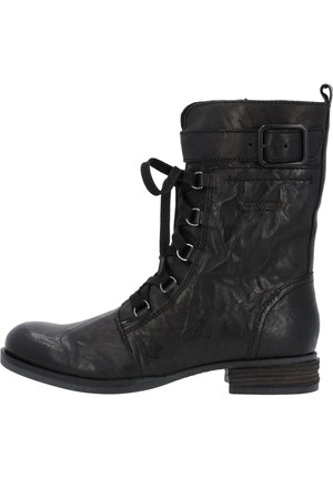 Black leather ankle boot with a rounded toe, lace-up front, and side buckle detail. Features a textured surface and low stacked heel.