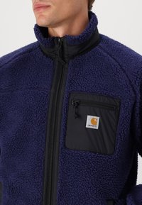 Carhartt WIP PRENTIS LINER - Forro polar - aura/black