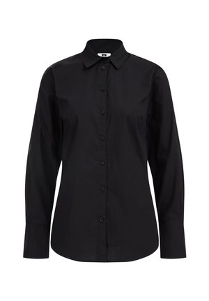 Must have pikkade varrukate ja nööpidega must särk, mis on valmistatud siledast kangast. Sellel on klassikaline kaelus, esimesed nööbid ja kohandatud lõige.