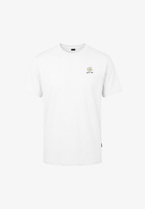 T-shirt blanc à manches courtes avec un petit motif d'œuf au plat et le texte "eggstra smile" sur la poitrine gauche.