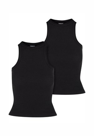 Mustad mustriga tank tops, snug disain kõrge kaela ja ilma varrukateta. Tekstuur tundub venitatav ja sile, omades lihtsat siluetti.