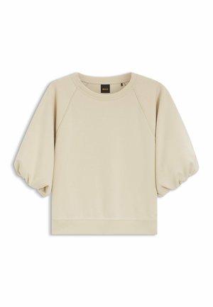 Sweat-shirt beige à manches courtes bouffantes, col rond, avec une petite étiquette "BOSS" à l'intérieur du col.