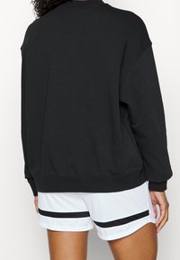 Nike Performance Mikina - black