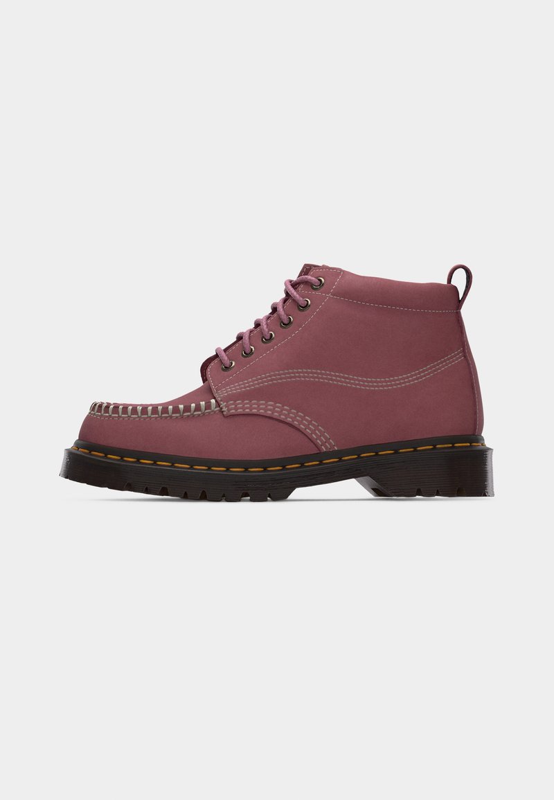 Mauve leather ankle boot with moccasin-style stitching, black sole with brown stitching, and lace-up front with metal eyelets.