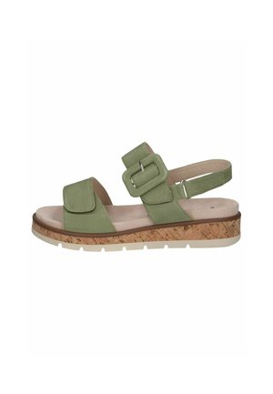 Green suede sandal with a wide strap, adjustable buckle, and cork-textured midsole. Features a flat, textured rubber outsole.
