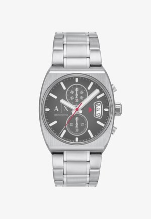 Nerezové hodinky se čtvercovým šedým ciferníkem, výraznými bílými hodinovými značkami, subciferníky a červeným akcentem na vteřinové ručičce a zobrazení data.