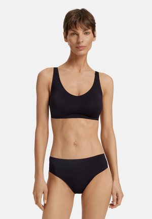 INVISIBLE TOUCH - T-paitaliivit - black