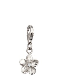 Charm en argent en forme de fleur à cinq pétales, avec une petite pierre claire au centre, fixé à un clip métallique. Surface texturée avec une finition polie.