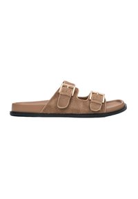 Brown faux fur slide sandals with two adjustable gold buckles, a smooth light brown footbed, and a black rubber sole.