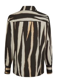 Langærmet skjorte i let stof med et markant zebra mønster i sort og creme, med spids krave og knapmanchetter.