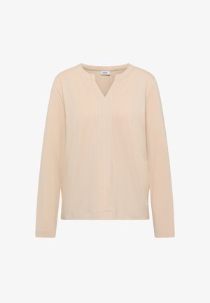 Beige Bluse mit langen Ärmeln und V-Ausschnitt, aus strukturiertem Stoff, mit zentraler Naht und lockerem Schnitt. Markenetikett am Kragen sichtbar.