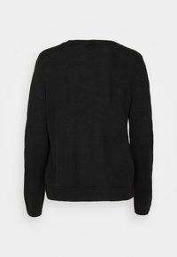 Pull noir, tissu tricoté, col rond, manches longues, couleur unie, ourlet et poignets côtelés, texture lisse, design minimal, sans embellissements.