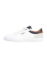 White sneaker with a smooth leather upper, navy accent on the tongue, brown leather heel tab, and grey suede detail on the back.