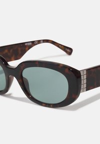 Guess Saulesbrilles - blonde havana