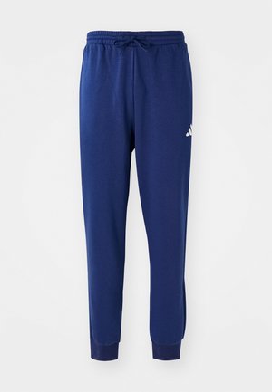 adidas Sportswear FEELCOZY - Pantalon de survêtement - dark blue/white