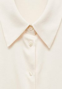 Mango Bluza z gumbi - off-white