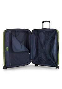 Valigia rigida verde con una tasca con zip e cinghie interne, caratterizzata da un rivestimento blu navy e quattro ruote per la mobilità.