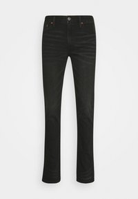 Jean en denim noir avec une coupe ajustée, doté d'une fermeture éclair, de cinq poches et d'une texture subtilement délavée.