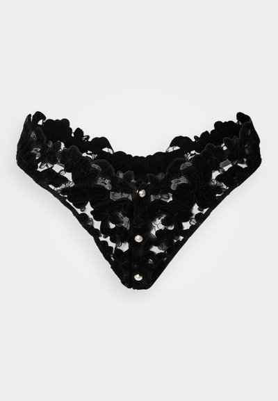 Black lace bikini with floral patterns and scalloped edges. Features three decorative buttons at the front. Soft texture and sheer design.