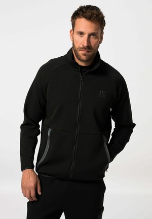 Black zip-up fleece jacket with a high collar, featuring gray side accents and a logo on the chest. Smooth texture, relaxed fit.
