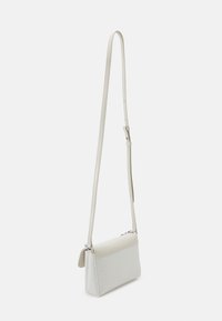 Calvin Klein RE LOCK MINI CROSSBODY BAG - Borsa a mano - ecru