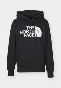 Zwarte hoodie van katoenmix, met een voorste kangoeroezak, verstelbare trekkoordcapuchon en groot wit logo op de borst.