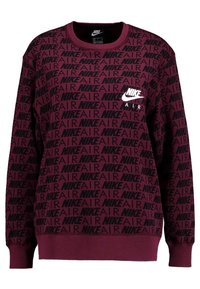 Burgundy sweatshirt med ett upprepande svart "NIKE AIR" mönster. Rund hals, långa ärmar och elastiska mudd med en vit Nike-logga på bröstet.
