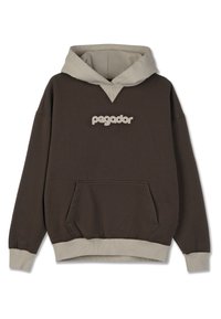 Hnedý pulóver s kapucňou, ktorý má béžovú dvojvrstvovú kapucňu, prednú kapsu a logo "pegador". Obsahuje rebrované manžety a pás.