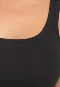 Black tank top featuring a rounded neckline and wide straps, made from smooth, stretchable fabric, with clean stitching detail.