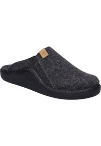 Pantuflas grises de felpa con suela de goma negra, con una costura decorativa y una pequeña etiqueta de cuero marrón. Diseño abierto en la parte trasera para facilitar su uso.