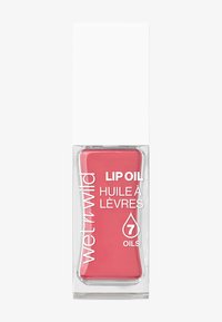 Huile à lèvres dans un contenant rectangulaire transparent, avec un liquide rose et un capuchon blanc. Le texte sur la bouteille indique "Huile à lèvres" et "7 huiles".