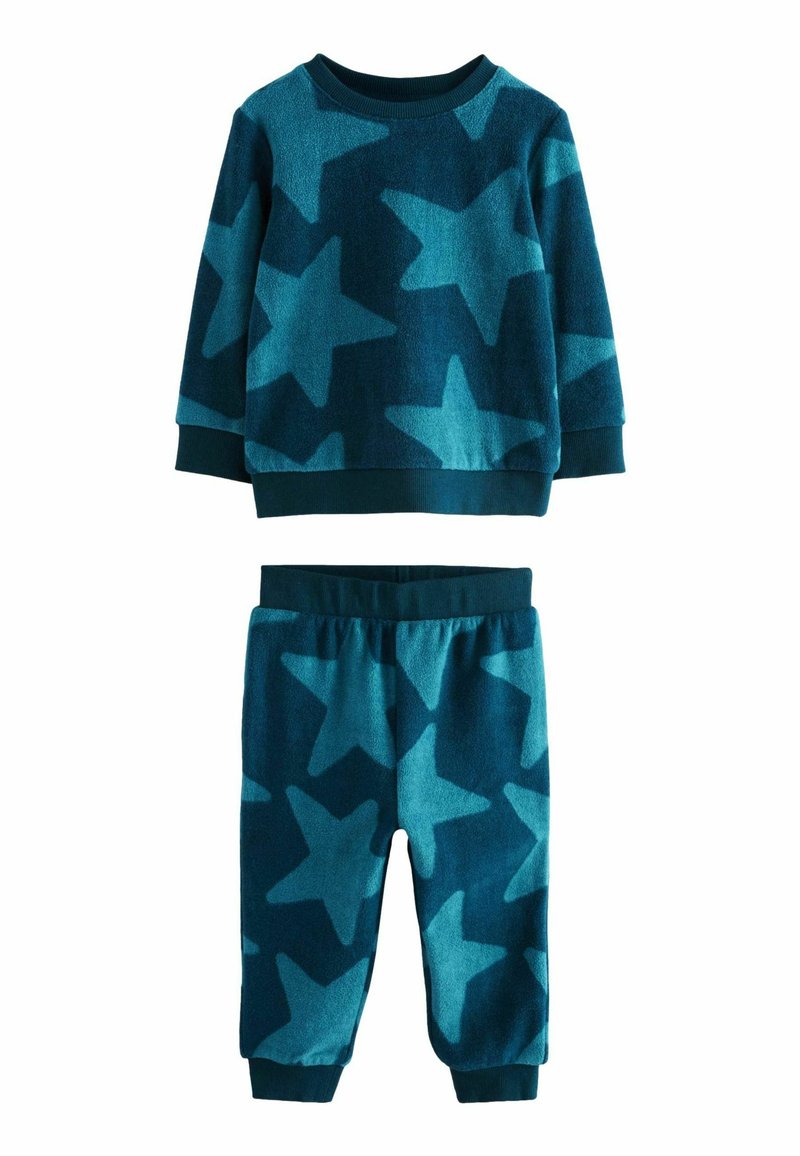 Fleece-Loungewear-Set in Petrol, mit großen, auffälligen Sternmustern. Das Oberteil hat lange Ärmel und gerippte Bündchen; die Hose hat einen elastischen Bund.