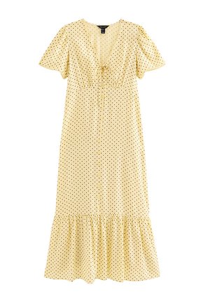 Robe midi jaune clair à pois noirs, manches courtes bouffantes, col en V avec nœud, boutons sur le devant et ourlet à volants.