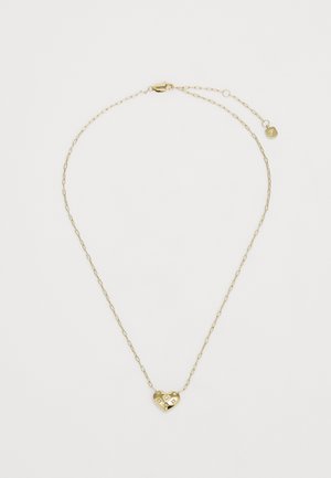 Collier en forme de cœur en ton doré avec une surface texturée, ornée d'accents floraux et d'une chaîne délicate. Fermeture à clip avec un charme logo supplémentaire.