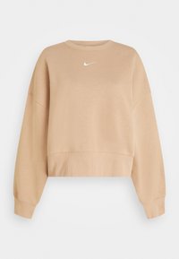 Krémová zkrácená mikina se zaobleným výstřihem, spadlými rameny a žebrovanými manžetami. Na hrudi se nachází malé bílé logo Nike. Měkká textura.