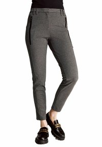 Gray slim-fit pants with a textured finish, featuring side zip pockets, a fitted waistband, and contrasting black piping detailing.