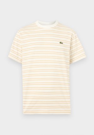 T-shirt z krótkim rękawem i okrągłym dekoltem, z cienkimi poziomymi beżowymi paskami na białym tle, z małym zielonym logo krokodyla na piersi.