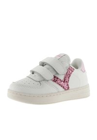 Vita lädersneakers med två justerbara kardborreband, glittrande rosa detaljer, perforerad tå och gummisula.