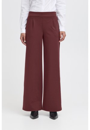 Maroon wide-leg pants made of soft fabric with a high elastic waistband, featuring front pleats and a smooth texture.