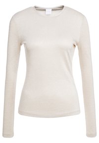 Pitkähiha, napakka paita vaaleassa beigeissä, pehmeässä kankaassa, jossa on lievää kiiltoa. Pyöreä kaula-auko ja saumattomat hihat, sopii kerrospukeutumiseen.