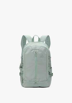 Light green backpack with padded shoulder straps, multiple zippered compartments, and side pockets, shown upright against white background.