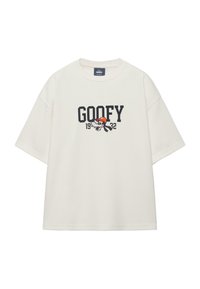 T-shirt blanc à manches courtes avec texte noir "GOOFY", visage de Dingo portant un chapeau orange, et "1932" imprimé en dessous du texte.