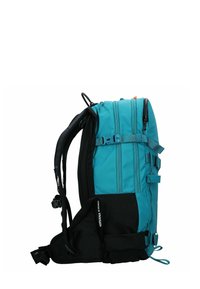 Zaino turchese con dettagli neri, dotato di spallacci regolabili, più zip e fibbie laterali. Forma rettangolare con un design strutturato.