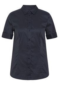 Kortärmad marinblå skjorta i ett slätt tyg med spetsig krage, knapp fram och vikta manschetter. Har en skräddarsydd passform och rundad nederkant.