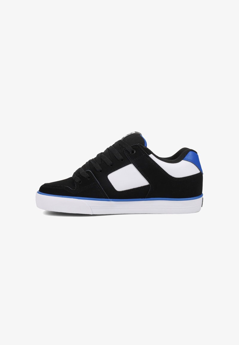 Black and white sneakers with blue accents, suede and canvas upper, flat white rubber sole, round toe, and lace-up closure.