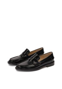 Black leather loafers with a rounded toe, decorative horizontal strap, low stacked heel, and smooth texture. Interior is beige.