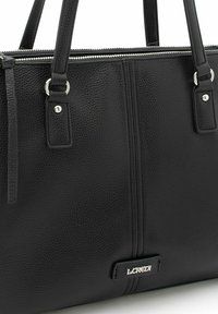 Black leather handbag with a textured finish, dual top handles, silver hardware, and a zip closure. Features a subtle logo accent.