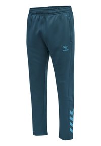 Trainingsbroek gemaakt van zacht, teal-kleurig stof, met een elastische tailleband, zijzakken en een blauw logo met chevronaccenten op de benen.